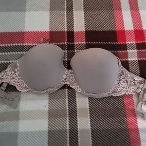 Gray and pink laced bra